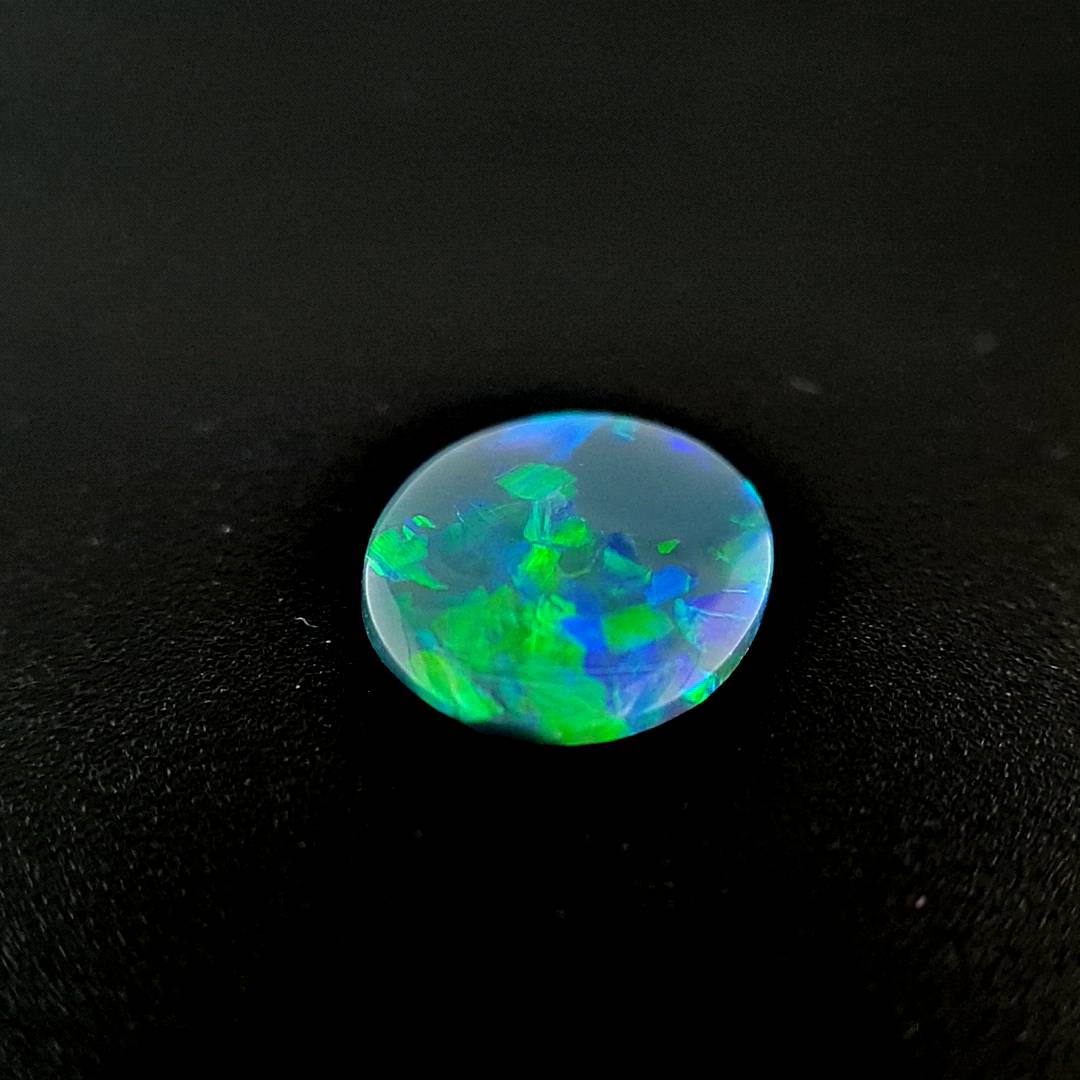 1.01ct Australian Opal, Black - Oval Cabochon