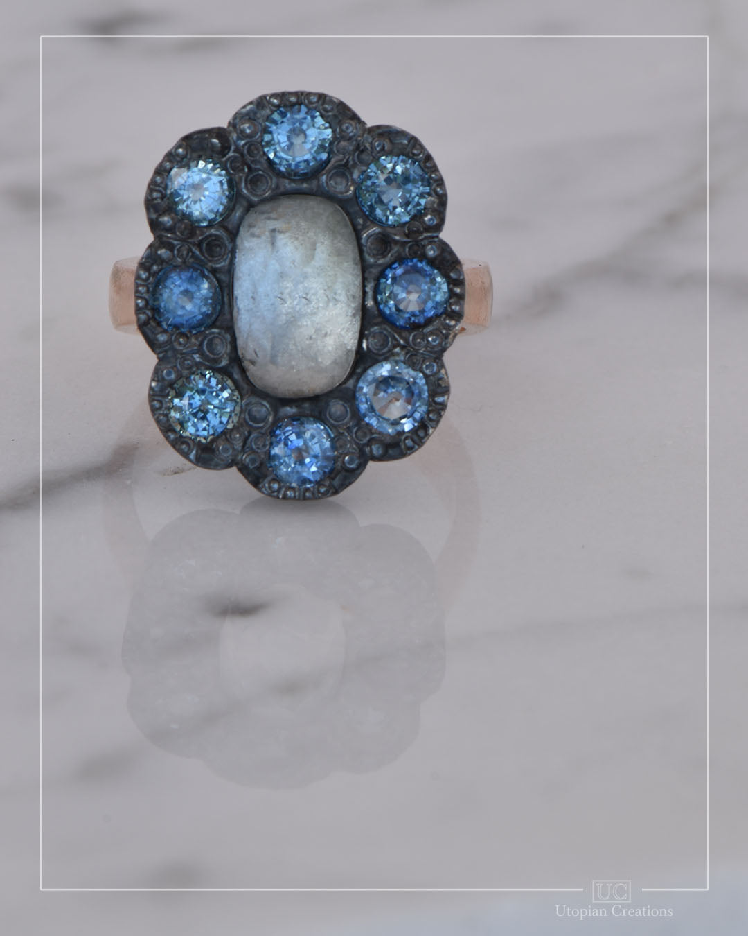 Indigo – Dress ring -  Blue Topaz and Sapphire Halo