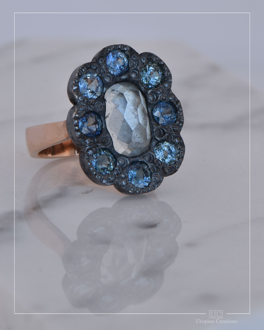 Indigo – Dress ring -  Blue Topaz and Sapphire Halo