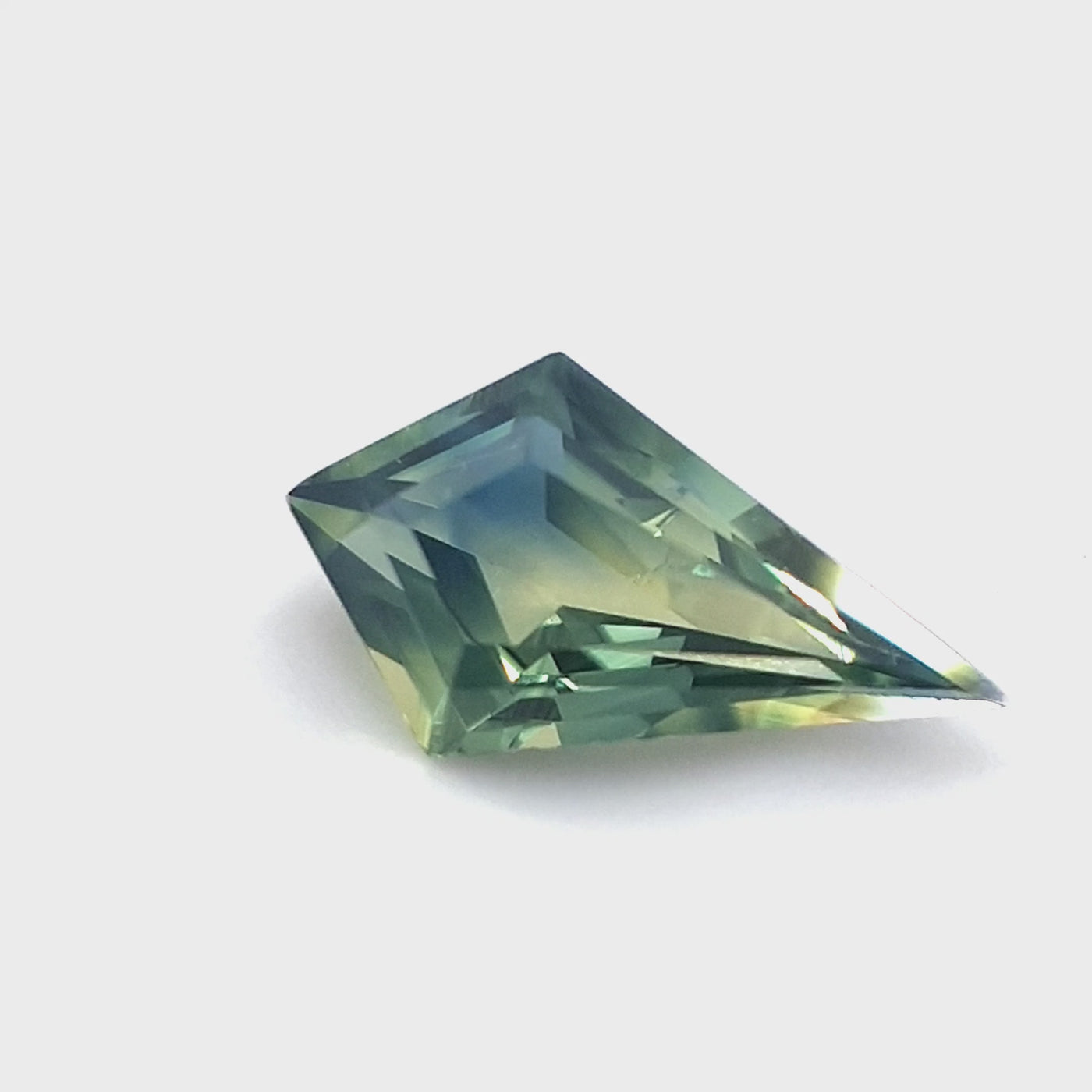 Australian Parti Sapphire – 0.74ct Kite, Step Cut, Blue yellow Teal