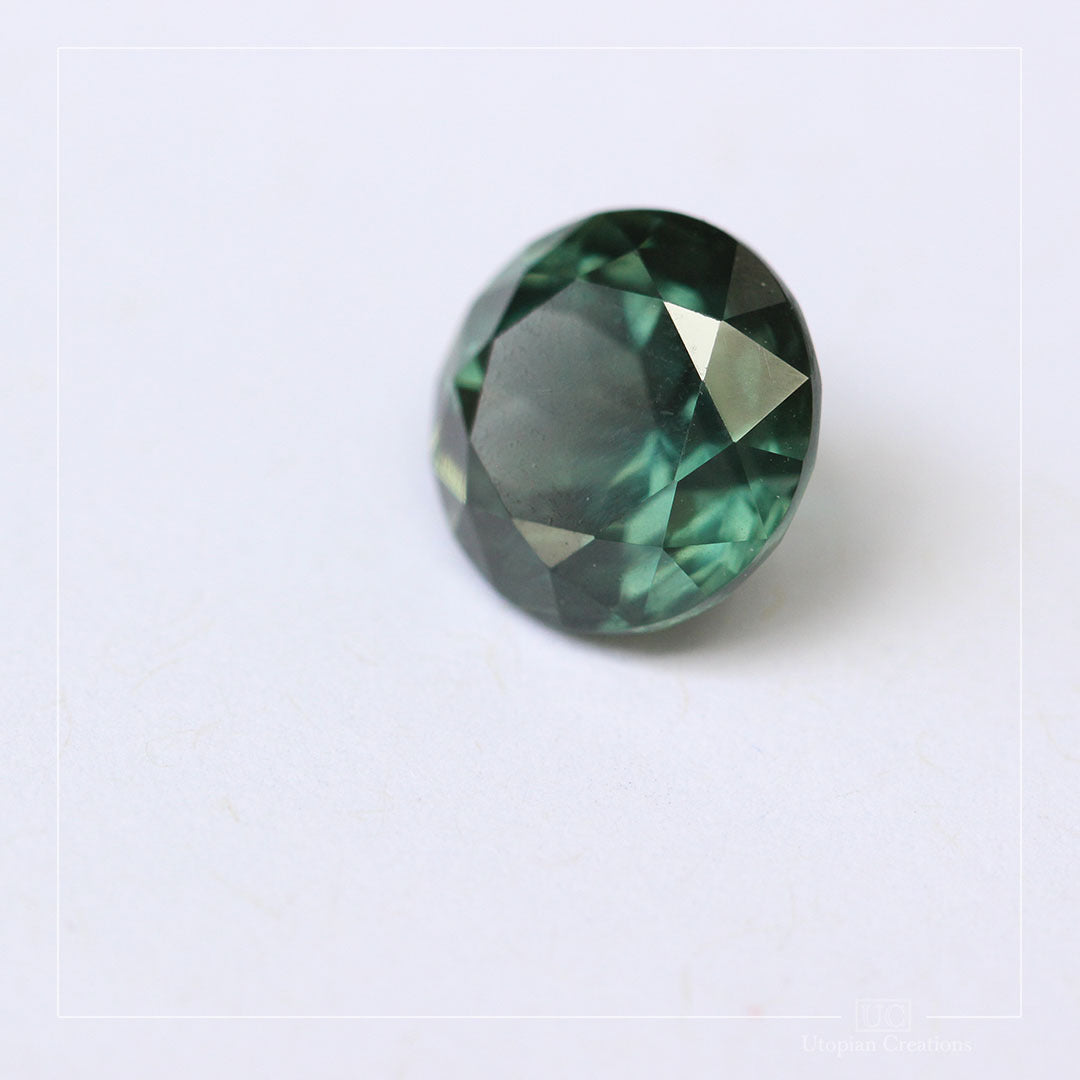 6.45ct  Australian teal green colour change to purple grey, round