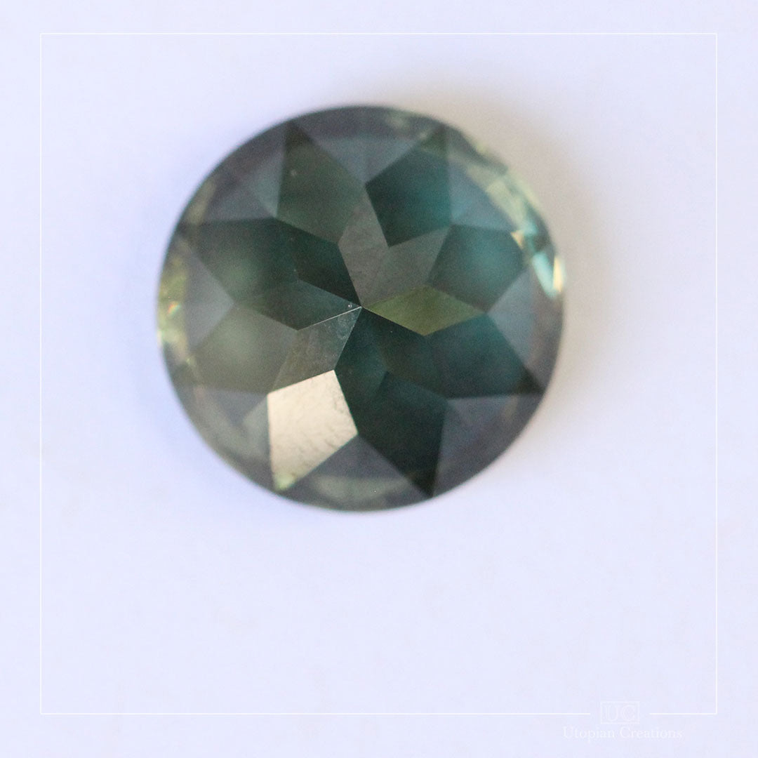 6.45ct  Australian teal green colour change to purple grey, round