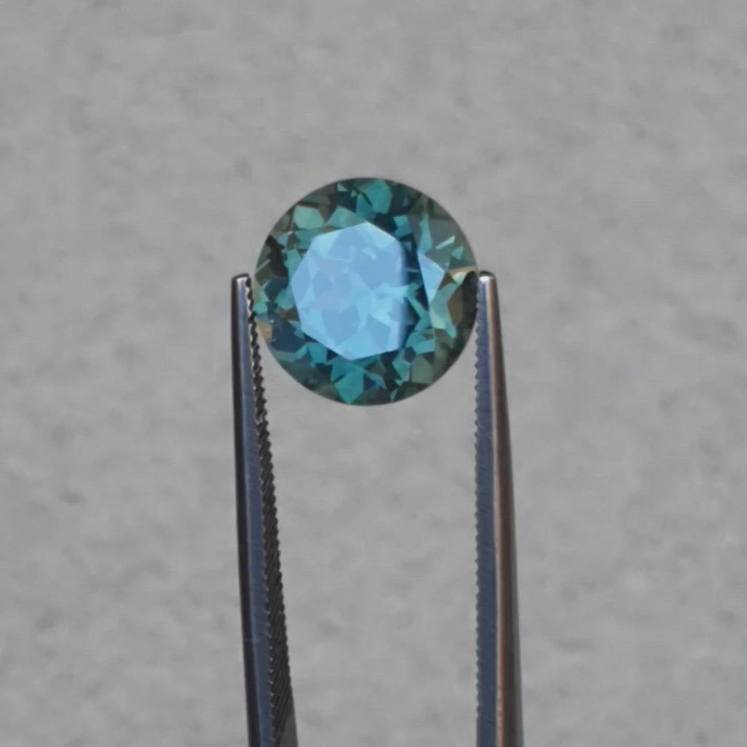 6.45ct  Australian teal green colour change to purple grey, round