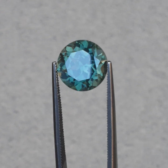 6.45ct  Australian teal green colour change to purple grey, round