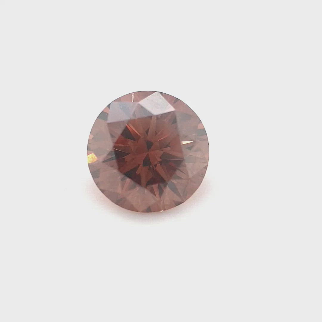 0.63ct Australian Cognac Argyle Diamond with flashes of Orange/Pink - Round