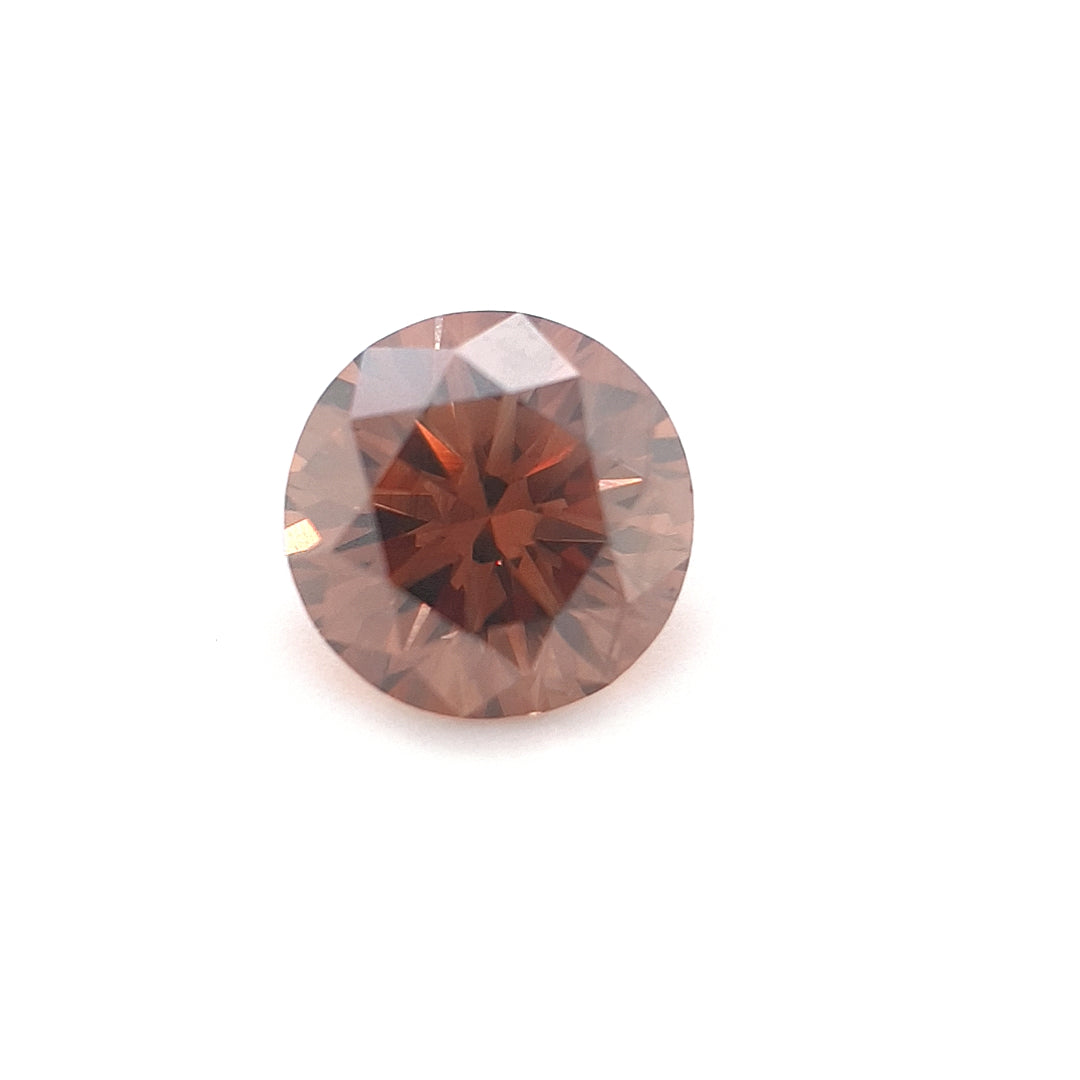 0.63ct Australian Cognac Argyle Diamond with flashes of Orange/Pink - Round