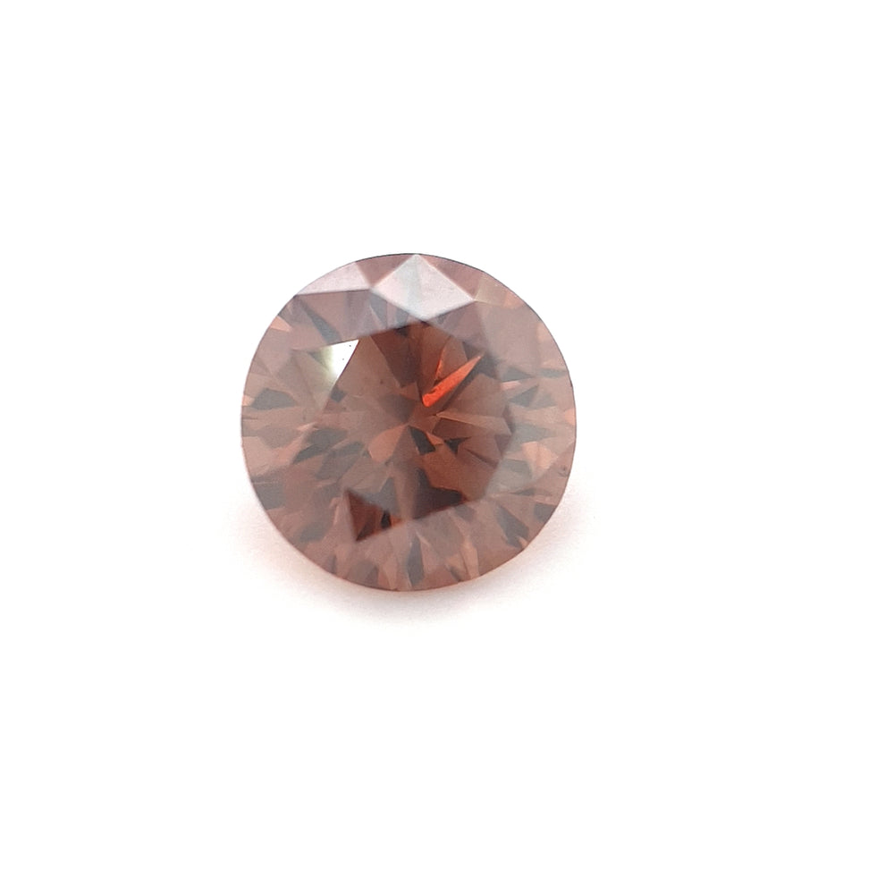 0.63ct Australian Cognac Argyle Diamond with flashes of Orange/Pink - Round