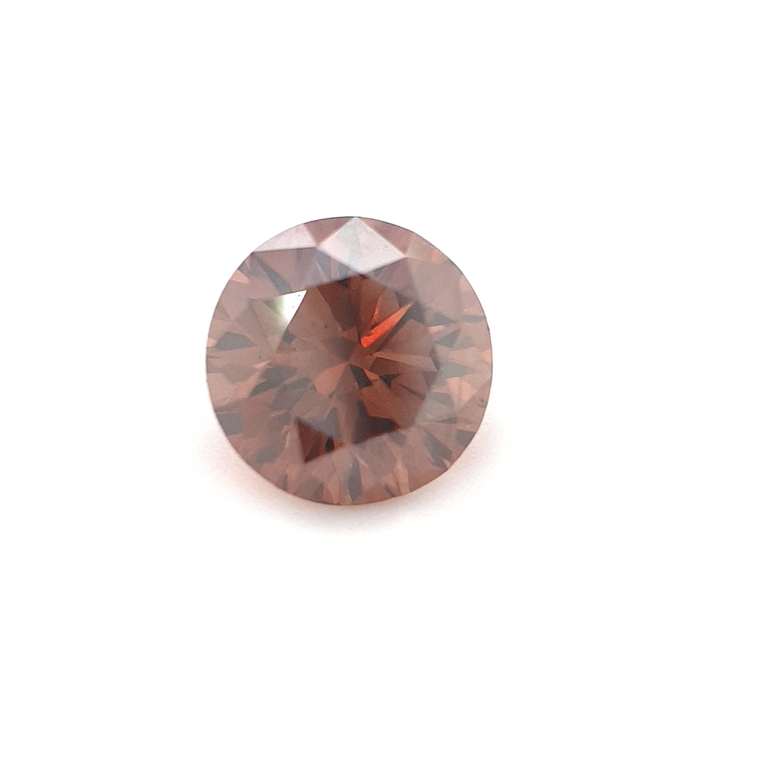 0.63ct Australian Cognac Argyle Diamond with flashes of Orange/Pink - Round