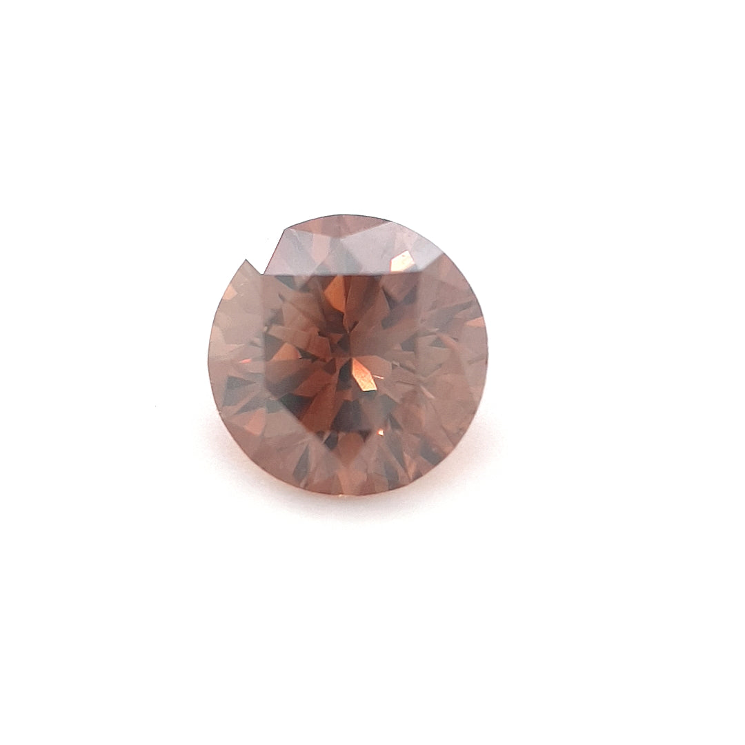 0.63ct Australian Cognac Argyle Diamond with flashes of Orange/Pink - Round